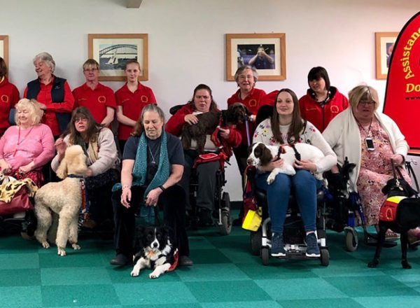 Group of Dog A.I.D service users and volunteers