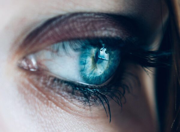 Sophie Hayes survivors of human trafficking blue eye close up