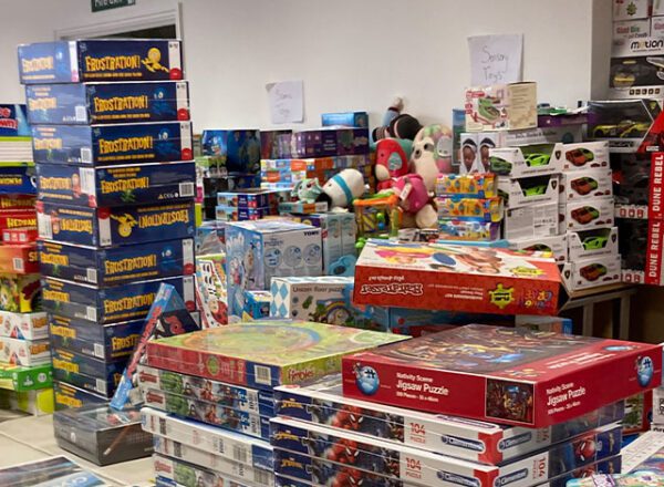 Warehouse full of Christmas gifts for children living in poverty